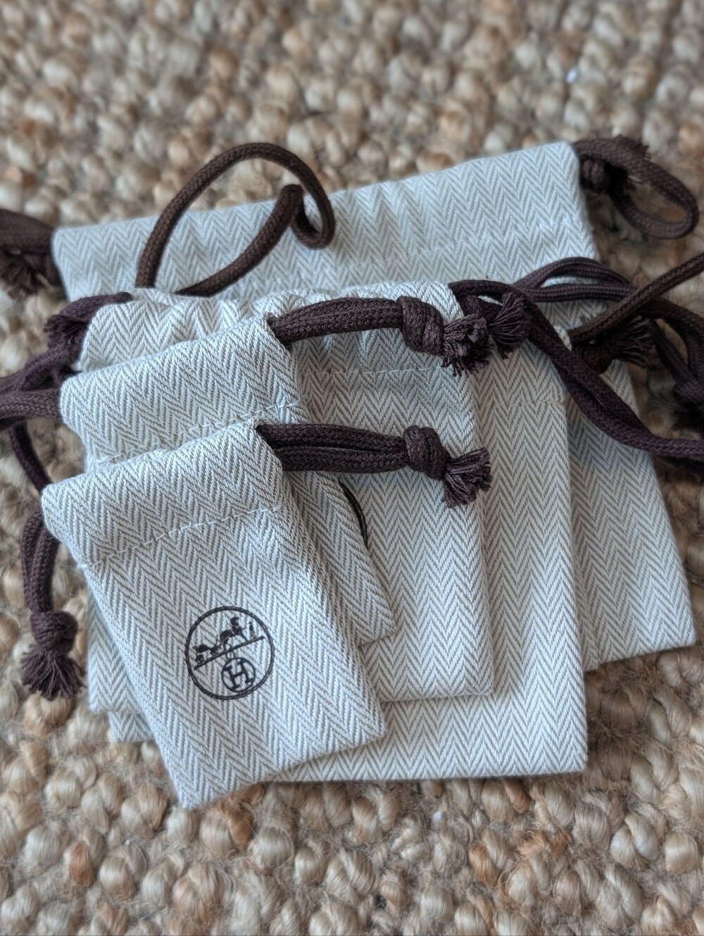 HERMES Authentic Drawstring Jewelry Pouches - Cream with Brown Trim